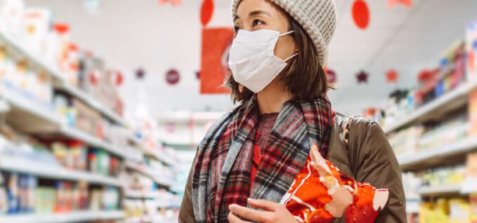 women holding chips bag