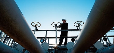 ExxonMobil Chemical Plant view from under pipes ExxonMobil Chemical Plant view from under pipes