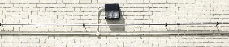 Wall with pipe and wiring