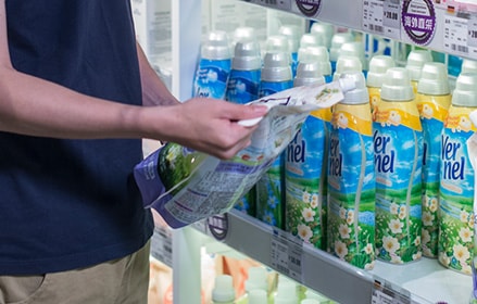 Man reviewing cleaning supplies