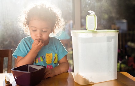 Child with storage container