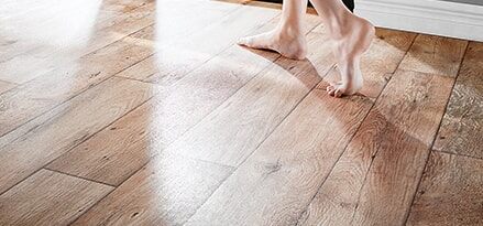 Ballet Dancer on Wooden Floor