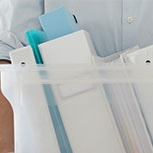 Man carrying plastic tub