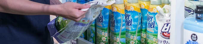 Man reviewing cleaning supplies